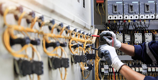 Professional Electrician technician working in Mary Esther, FL